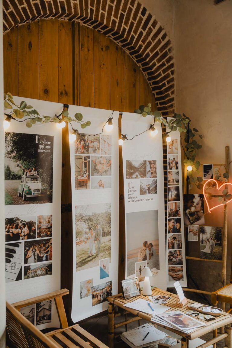 Ambiance chaleureuse, meubles en bois, guirlandes et photos de mariages et familles dans les Landes exposées avec soin.